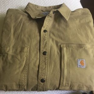 Carhartt shirt jacket with plaid fleece lining.